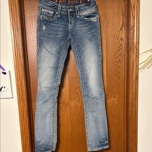 Rock Revival Blue Straight Leg Jeans with Subtle Distressing